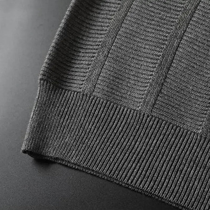 Close-up of a men's breathable knit polo shirt, highlighting its unique textured fabric for comfort and style.