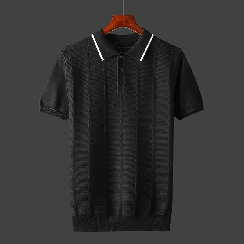Detail of a men's premium knit polo shirt collar & buttons, showcasing its high-quality textured fabric & craftsmanship.