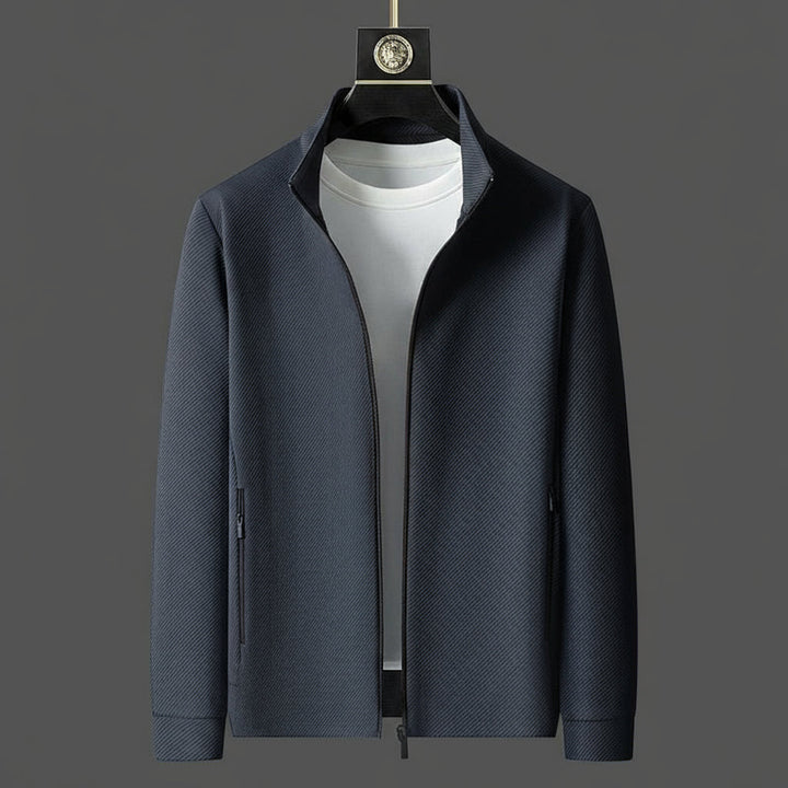 High-quality men's two-piece tracksuit featuring a zip-up jacket & tapered joggers for stylish comfort.