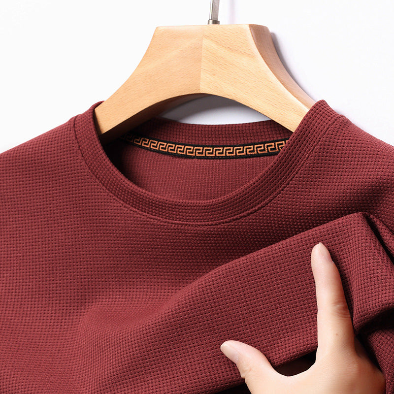 Classic men's waffle knit t-shirt, providing comfortable, premium textured style for everyday casual wear.