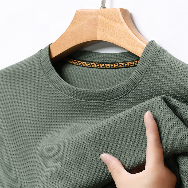 Breathable men's waffle knit t-shirt, a premium short sleeve tee offering comfortable and versatile style.