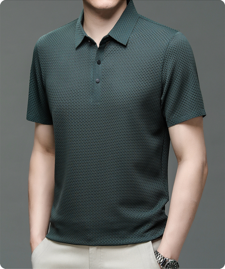 Modern man's classic fit polo shirt, performance fabric, suitable for smart casual occasions.