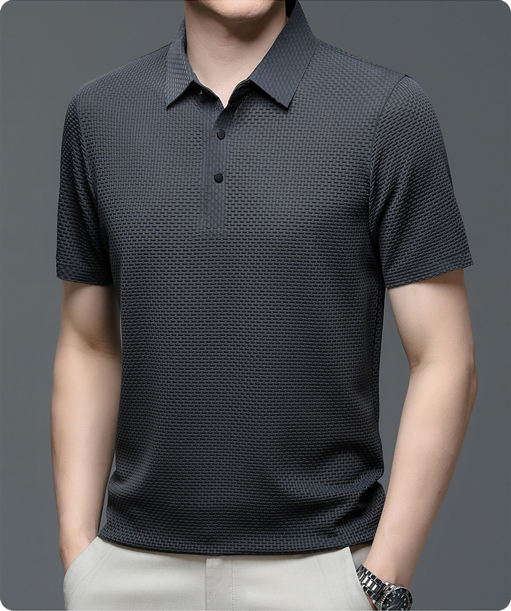 Elegant men's performance top, short sleeve, collared polo for versatile and everyday wear.