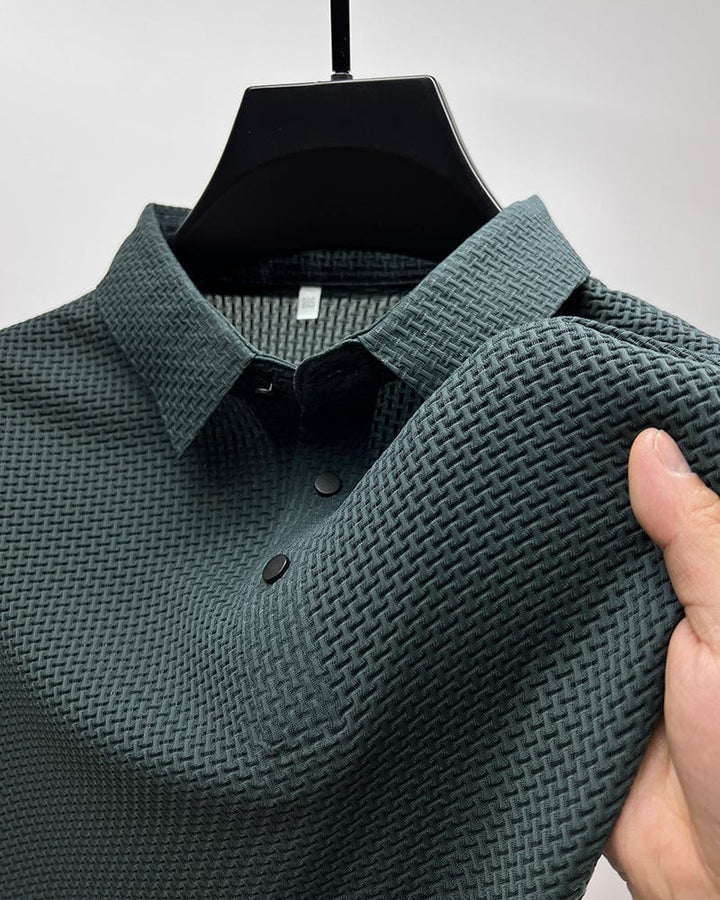 Classic fit men's polo shirt in performance blend, smart casual & versatile for any occasion.