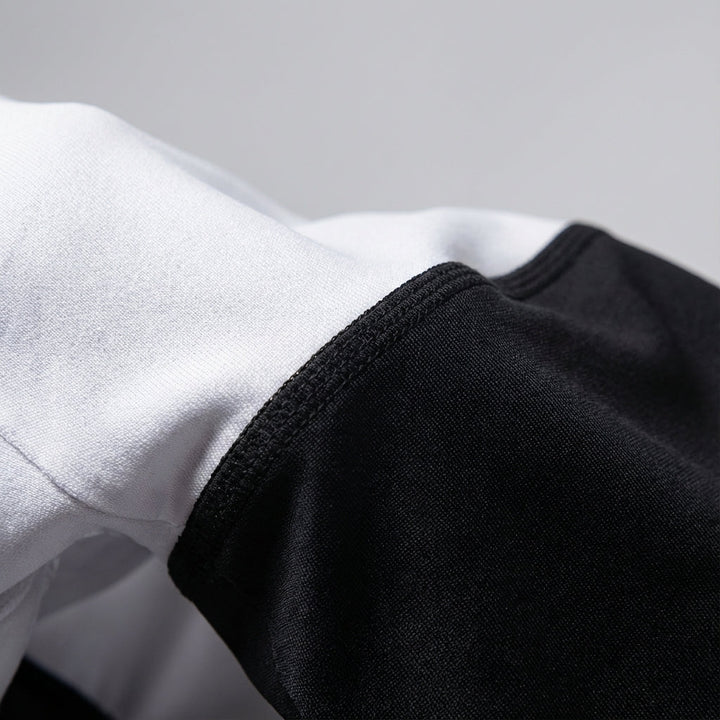 Aerodynamic men's cycling kit with a form-fitting jersey and padded shorts, sportswear.
