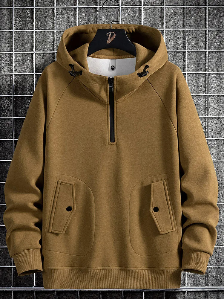 Men's quarter-zip hoodie with flap pockets, comfortable & relaxed fit for casual wear.