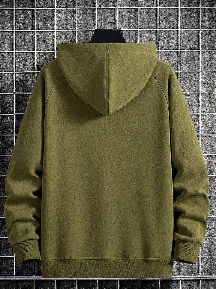 Soft men's quarter-zip pullover hoodie with flap pockets, ideal for comfortable everyday wear.