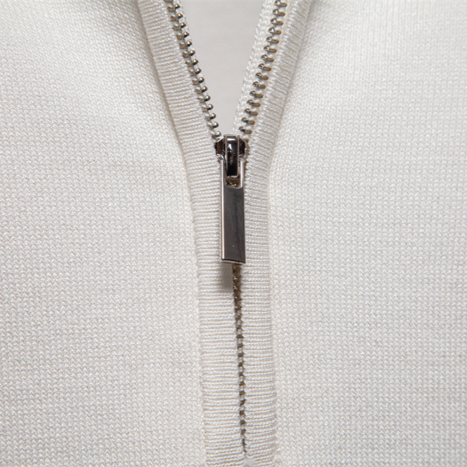Men's quarter-zip polo shirt, an essential cotton blend knit for effortless smart-casual fashion.
