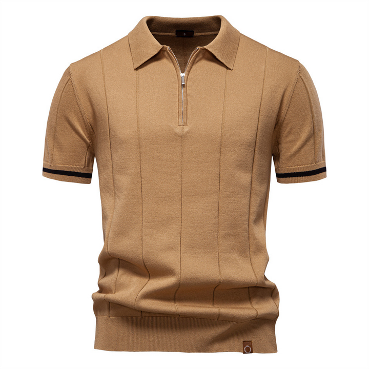 Men's quarter-zip polo shirt showing detailed knit texture, a quality cotton blend for lasting comfort.