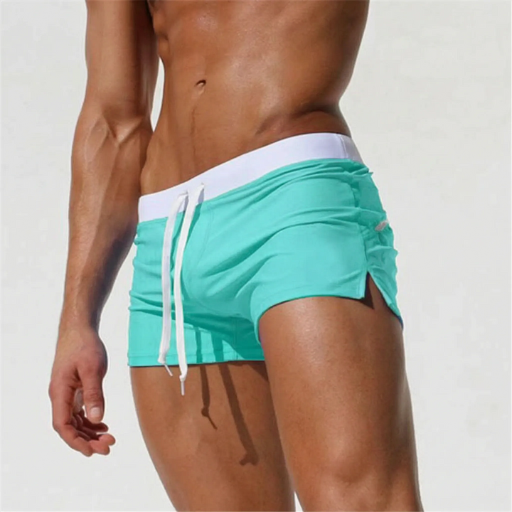Quick-dry men's fitted swim trunks for pool attire, durable fabric and secure fit.