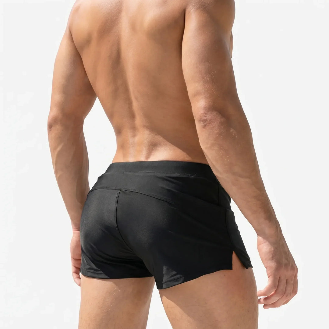 Men's active swim trunks: quick-dry beachwear with zipper pocket & drawstring waist. Perfect for pool & summer sports.