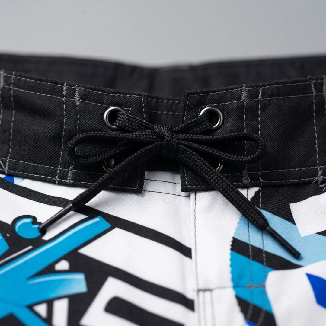 Tropical print quick-dry men's swim trunks, perfect boardshorts for beach, pool, & vacation.