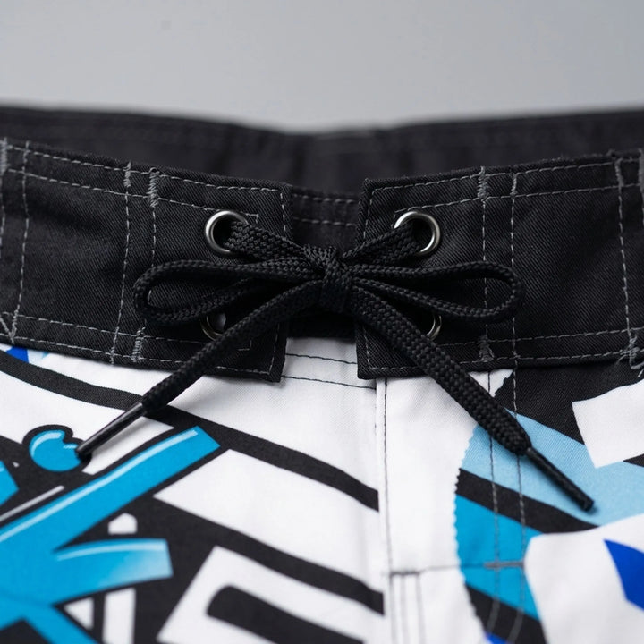 Tropical print quick-dry men's swim trunks, perfect boardshorts for beach, pool, & vacation.