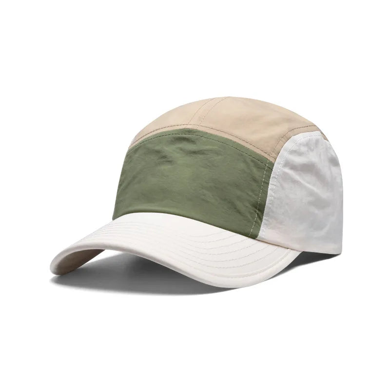 Man wearing quick-dry running cap with UV protection during a sunny outdoor run.