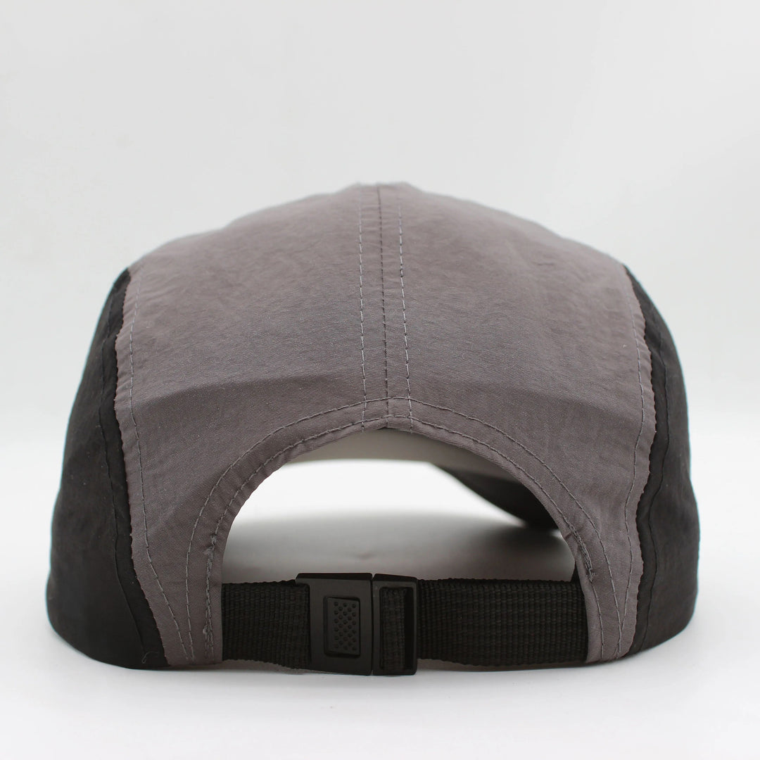 Breathable quick-dry men's running cap for sun protection & comfort during intense workouts.