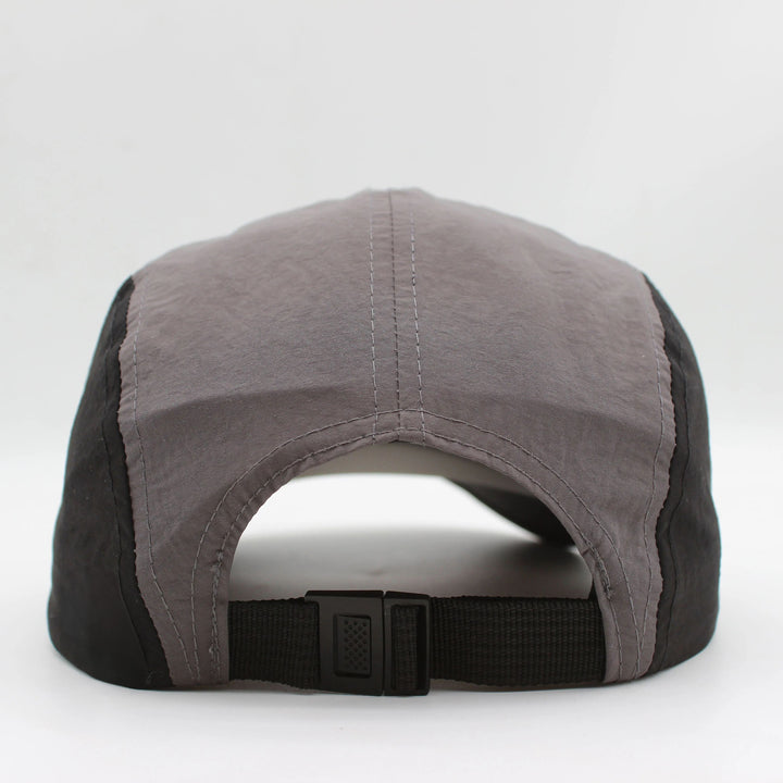 Breathable quick-dry men's running cap for sun protection & comfort during intense workouts.