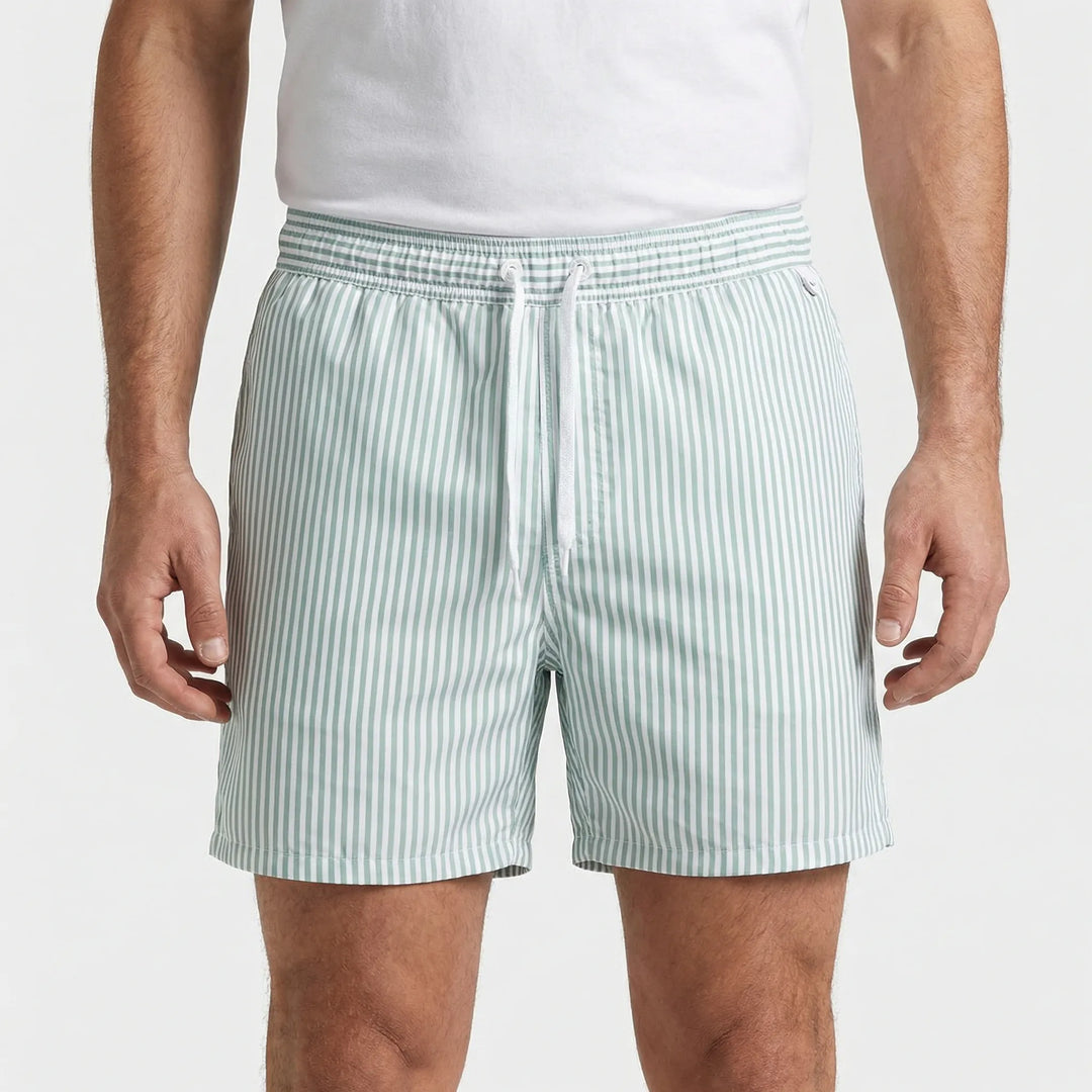 Blue and white striped quick-dry swim trunks for men, great for beach holidays and pool parties.