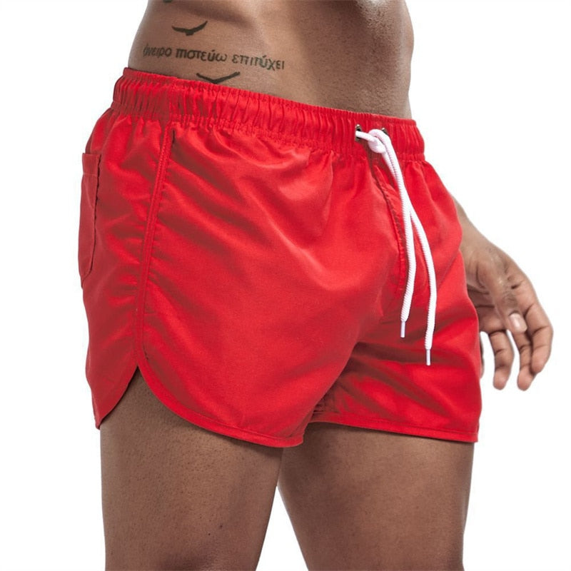 Detail of the quick-dry fabric texture on men's swim shorts, designed for comfort and fast drying.