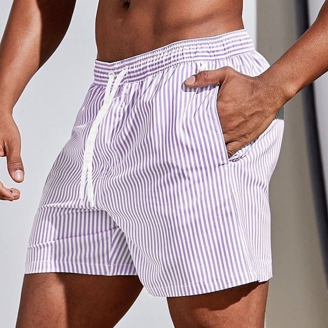 Athletic men's quick-dry swimwear shorts, essential for beach days, pool parties, or active summer sports.