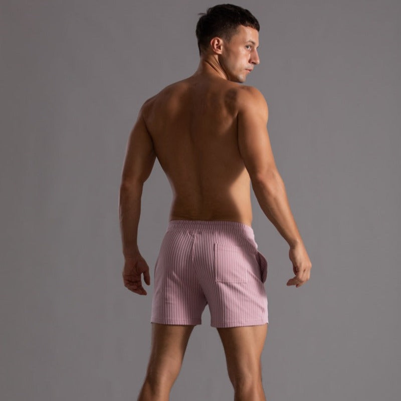 Performance men's swim shorts, quick-dry material and built-in support for active wear.
