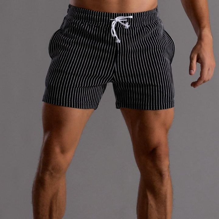 Trendy men's beach shorts, quick-drying and stylish, perfect for summer fashion.