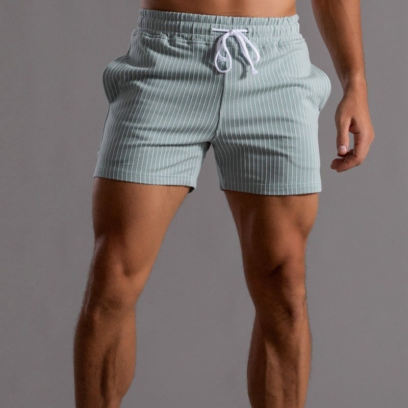 Men's quick-dry active shorts, with inner brief for support, ideal for summer activities.