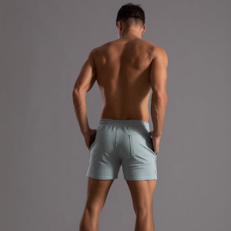 Men's quick-dry ripstop shorts, built-in support for athletic beach and pool wear.