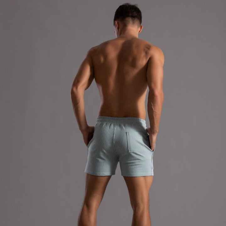 Men's quick-dry ripstop shorts, built-in support for athletic beach and pool wear.