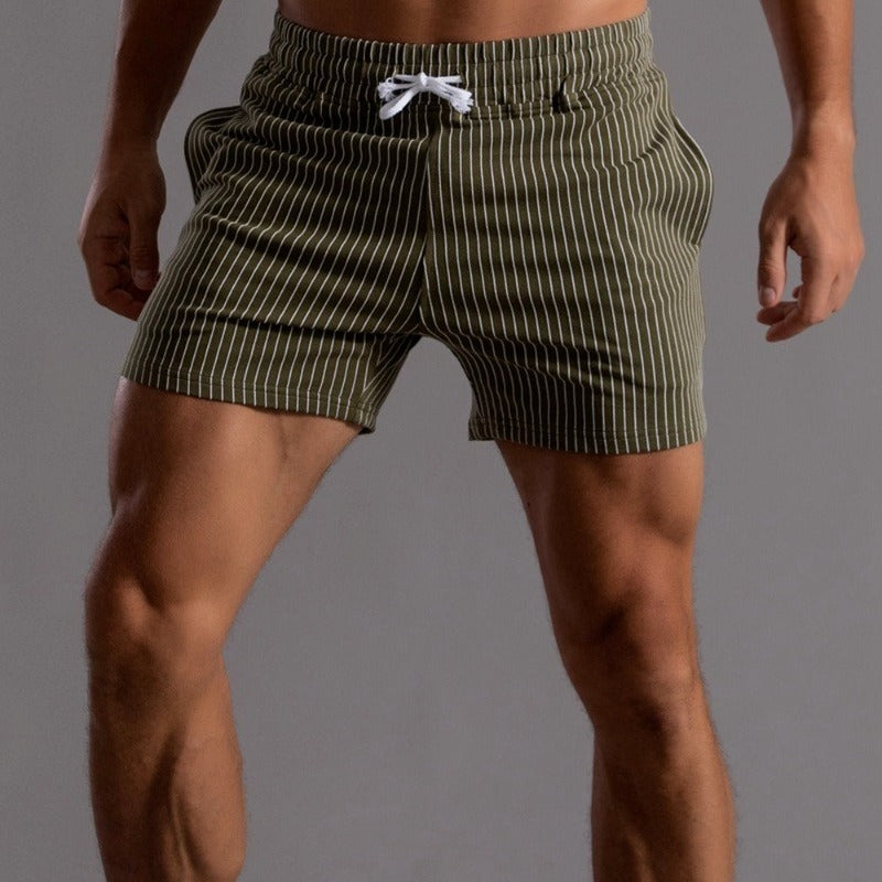Men's athletic swim trunks with drawstring waist and inner brief for comfort.