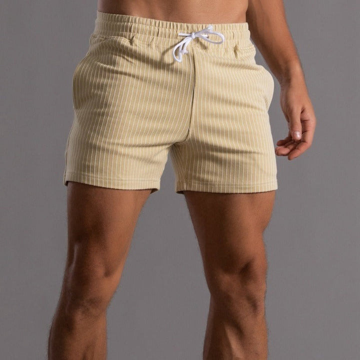 Activewear men's swim shorts, quick-dry design with supportive inner brief.