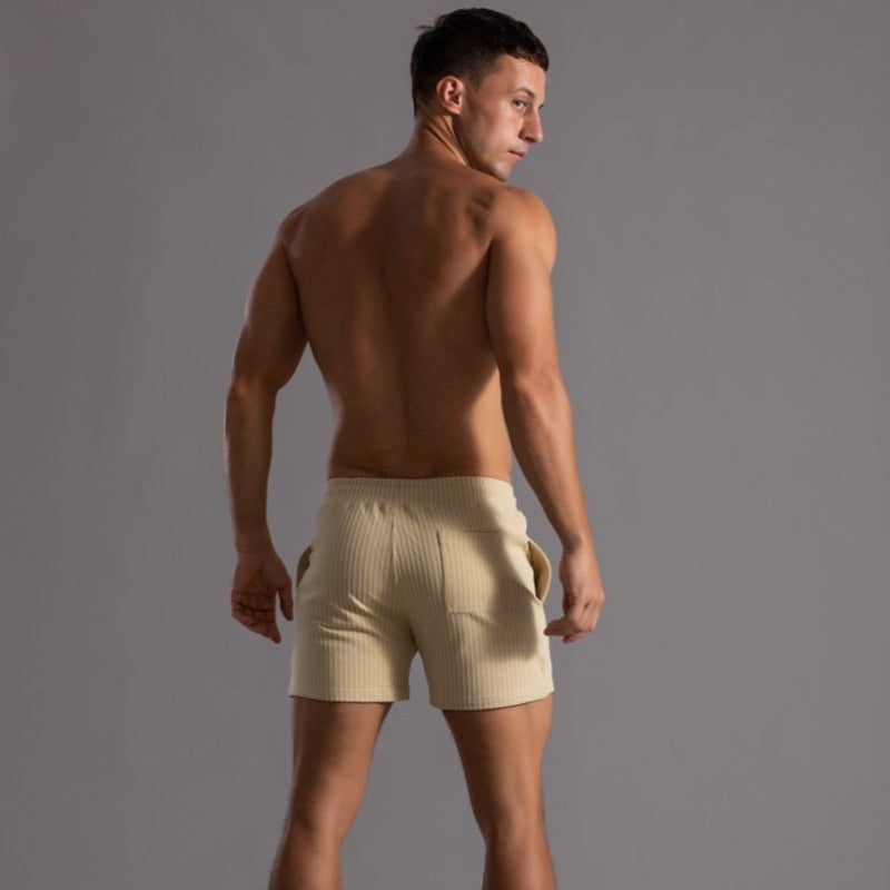 Durable men's quick-dry swim shorts, drawstring waist for a perfect fit.