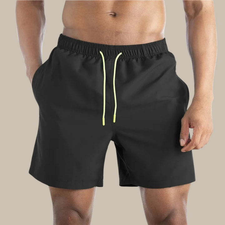 Stylish men's quick-dry swim shorts for ultimate water comfort. Essential summer swimwear for vacation.