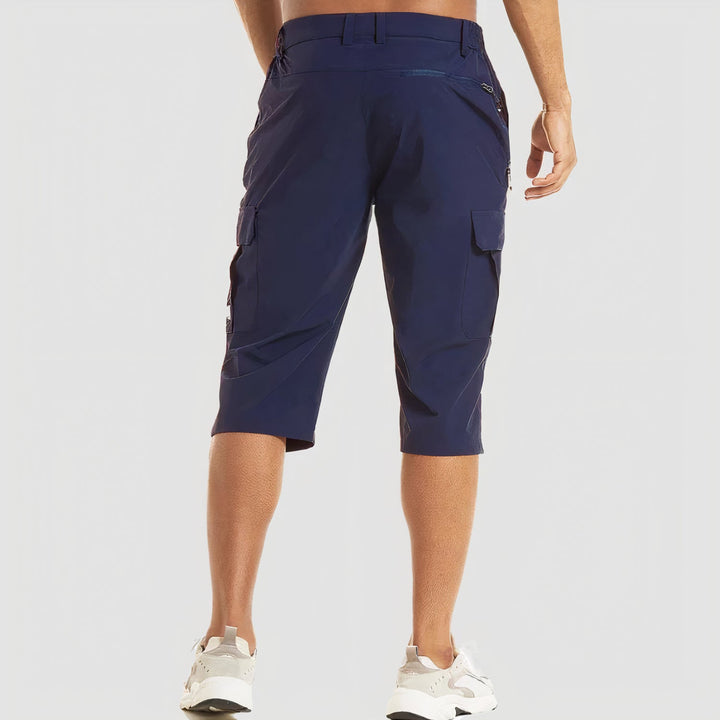 Durable men's cargo shorts for travel, featuring multiple pockets and quick-dry fabric.