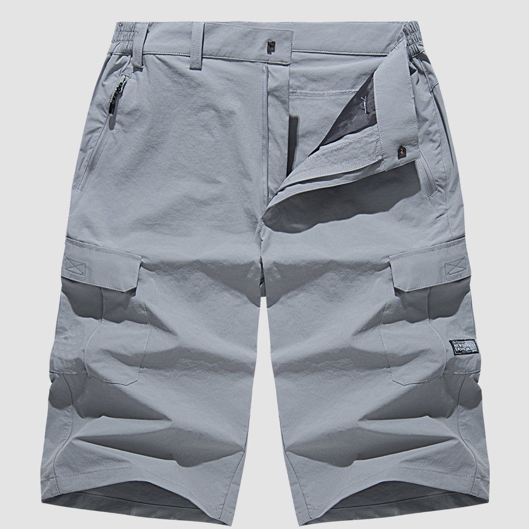Stylish men's quick-dry shorts with deep cargo pockets, great for travel and casual summer days.