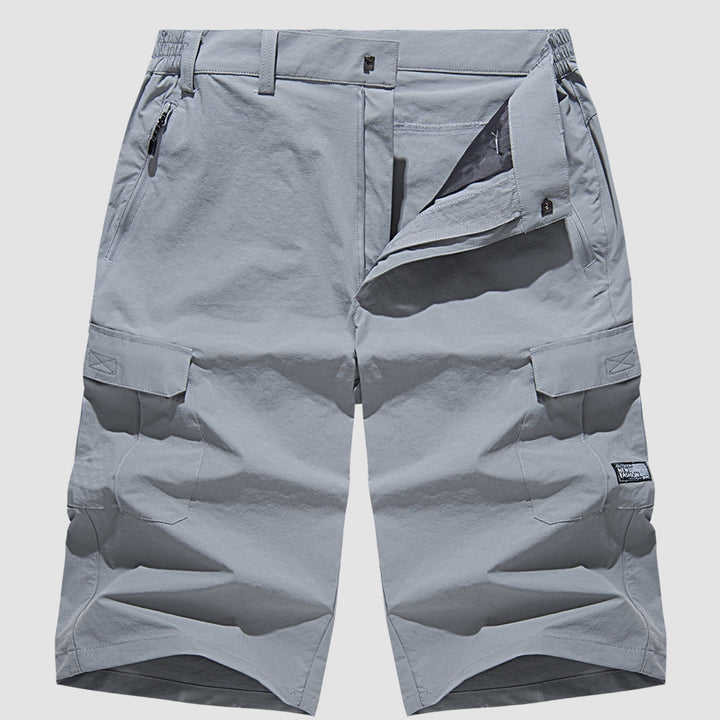 Stylish men's quick-dry shorts with deep cargo pockets, great for travel and casual summer days.