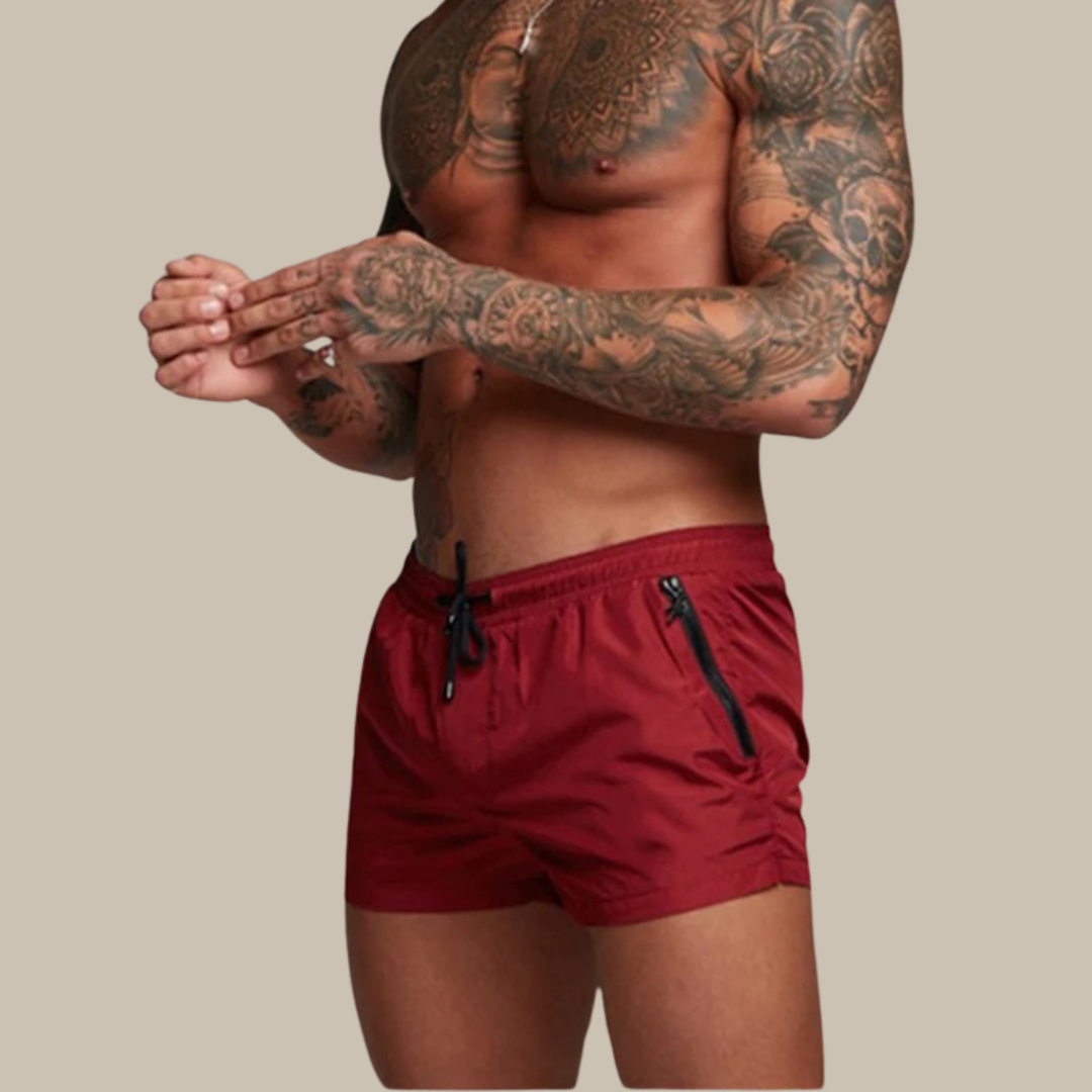 Comfortable men's stretch swim shorts, ideal for swimming, surfing & beach activities. Quick-drying design.
