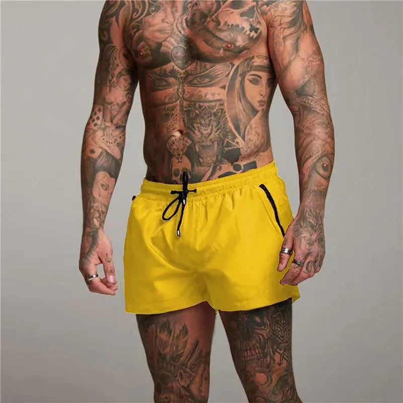 Modern men's quick-dry swim shorts. Stretch fabric provides comfort & style for beach, pool, & vacation.