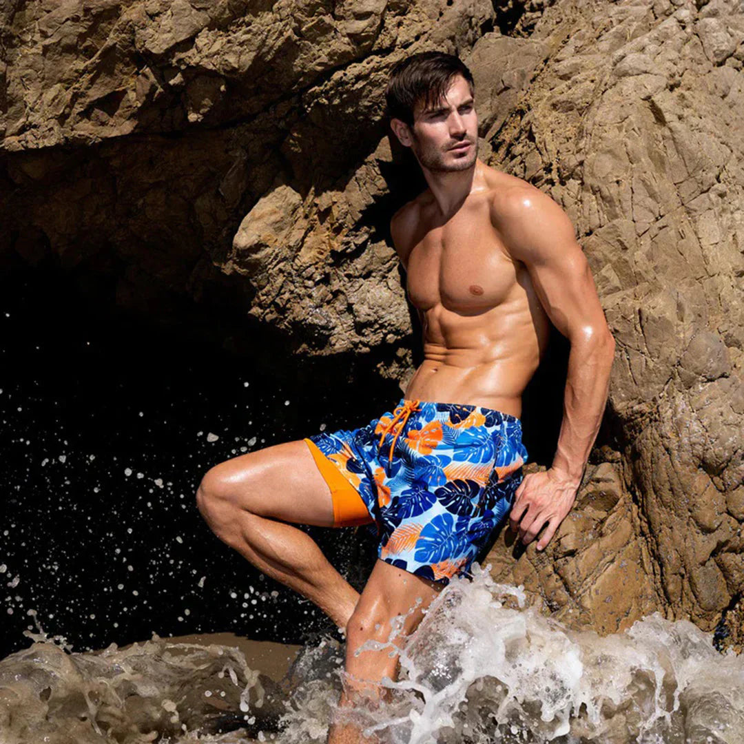 Men's quick-drying swim shorts with modern fit, ideal for beach, pool, and summer vacation.