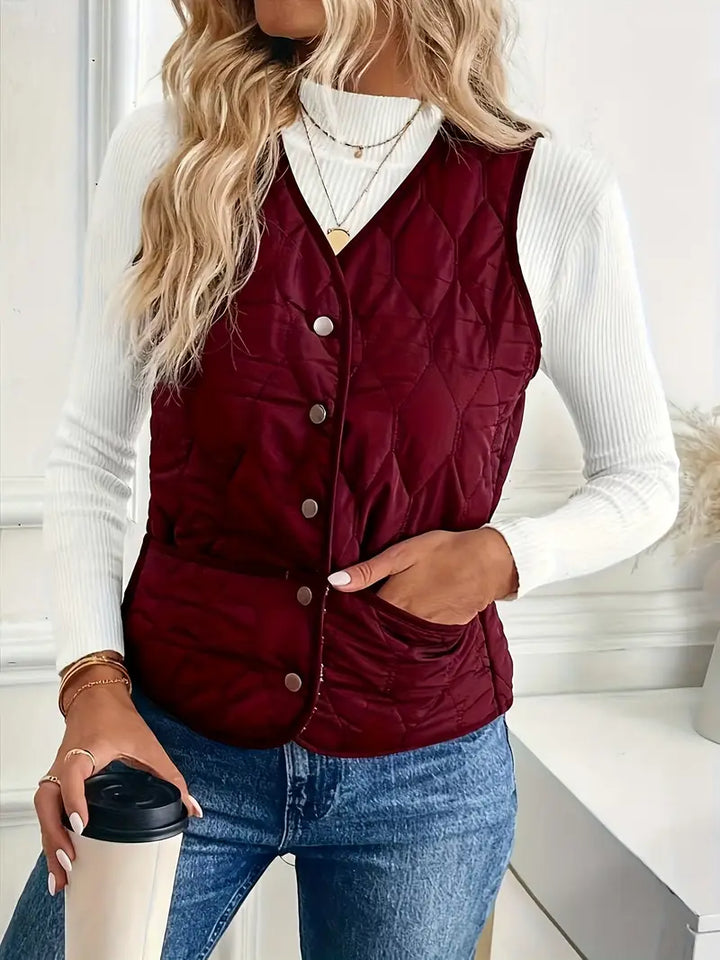Men's stylish quilted bomber vest with sherpa lining in an urban setting. Casual warm winter outerwear.