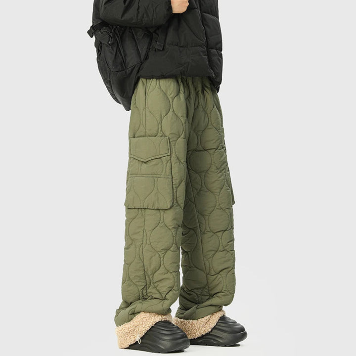 Warm men's fleece-lined quilted trousers. Essential winter pants for outdoor gear & cold weather.