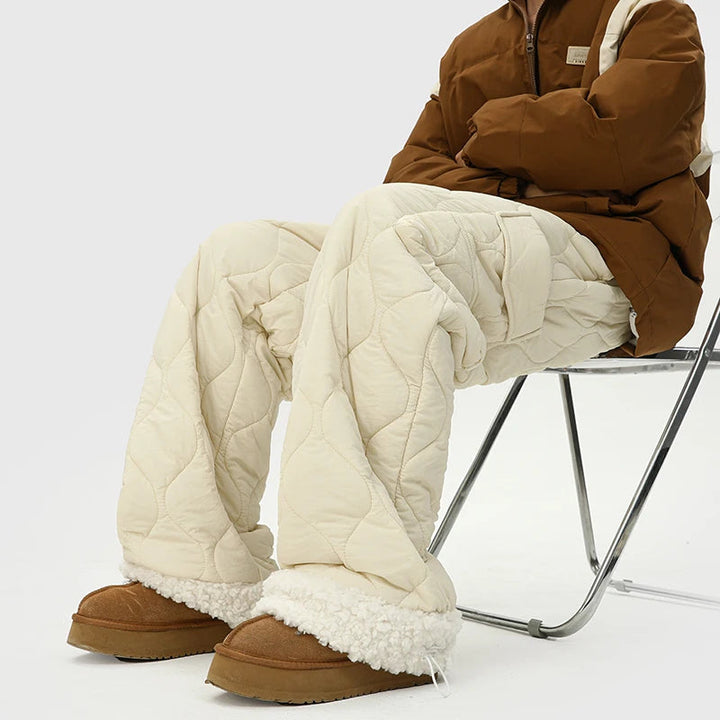 Stylish men's quilted winter trousers, fleece-lined for warmth & comfort. Features adjustable cuffs.