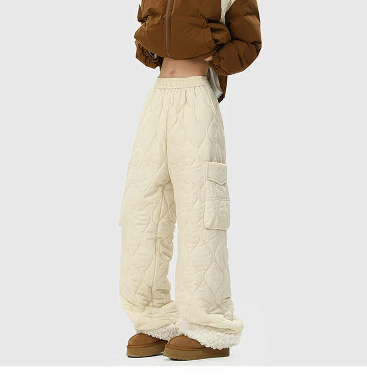 Durable men's quilted pants with cozy fleece lining. Perfect warm trousers for outdoor adventures.