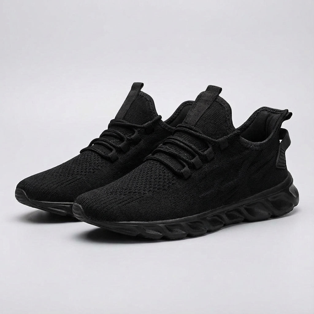 Side view of Randy men's breathable knit athletic sneakers, showcasing their lightweight and comfortable design.