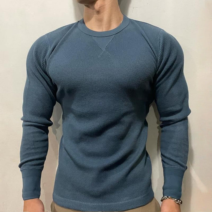 Men's short sleeve muscle shirt, engineered for peak athletic performance. Essential gym wear & versatile active top.
