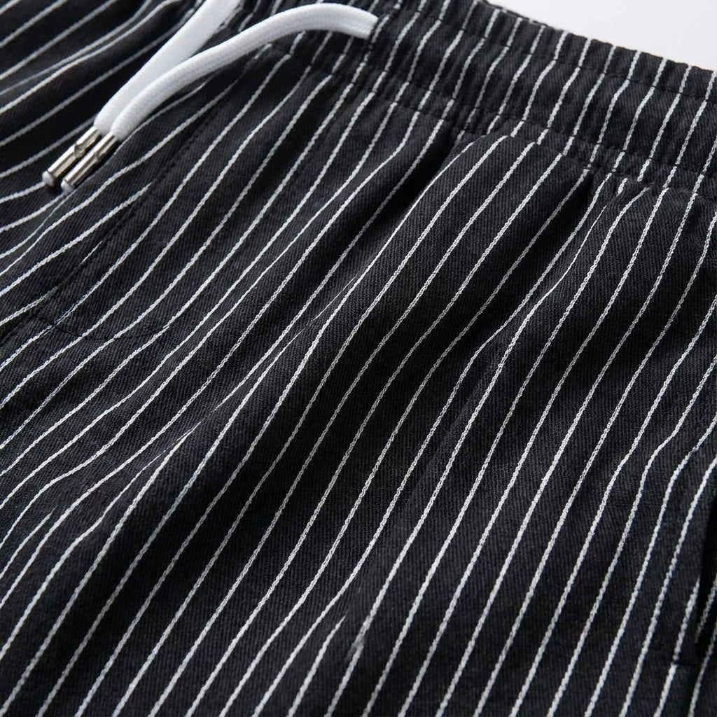 Comfortable men's striped athleisure shorts by Reed, suitable for sports and daily wear.