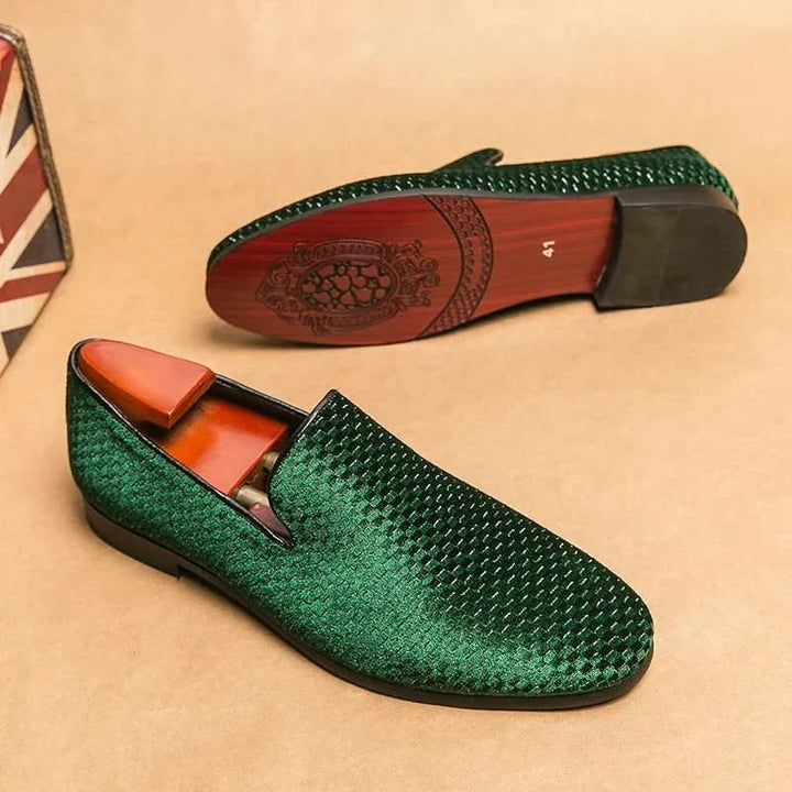 Men's refined black slip-on loafers, perfect for an elevated, elegant smart casual look.