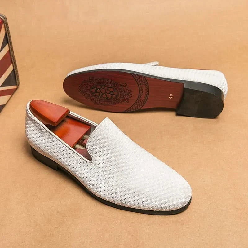 Refined men's black loafers, classic slip-on shoes for office, casual, and elegant events.