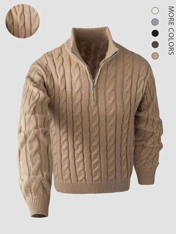 Close-up of a men's elegant cable knit quarter-zip sweater, showing detailed knitwear texture & classic style.