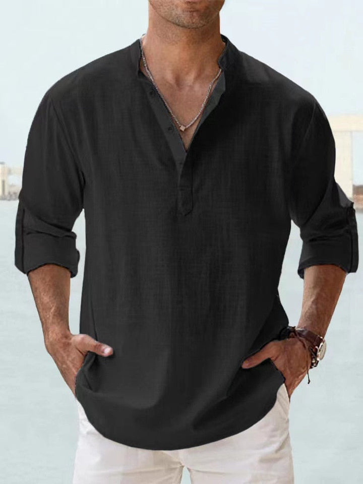 Man wearing refined casual shirt, paired with jeans. Relaxed men's fashion, comfortable everyday style.