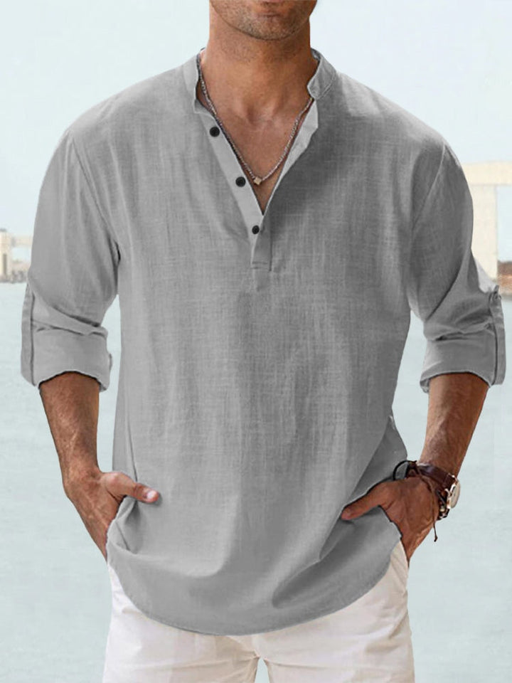 Man in smart casual refined shirt, perfect for work or events. Versatile long sleeve menswear.